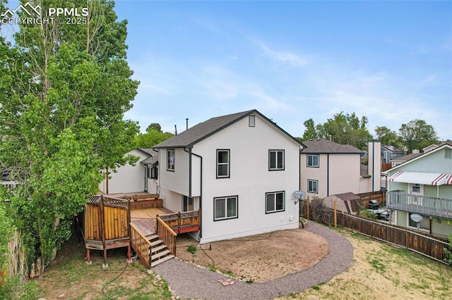 4465 Archwood Dr, Colorado Springs, CO 80920 - rear view of property featuring a wooden deck