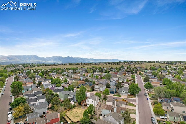 4465 Archwood Dr, Colorado Springs, CO 80920 - aerial overview of property's location with nearby suburban area and mountains