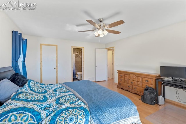 2620 Warrenton Way, Colorado Springs, CO 80922 - bedroom featuring wood finished floors, a ceiling fan, and ensuite bathroom