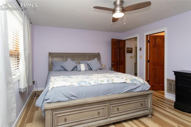 7815 Mallard Dr, Peyton, CO 80831 - bedroom featuring light wood-type flooring, ceiling fan, and baseboards