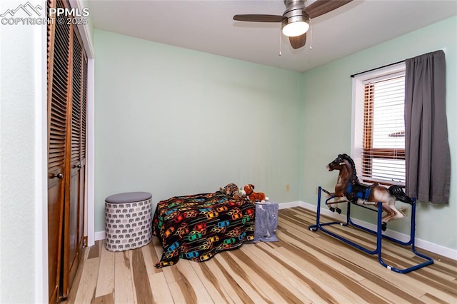 7815 Mallard Dr, Peyton, CO 80831 - workout area featuring wood finished floors, baseboards, and a ceiling fan