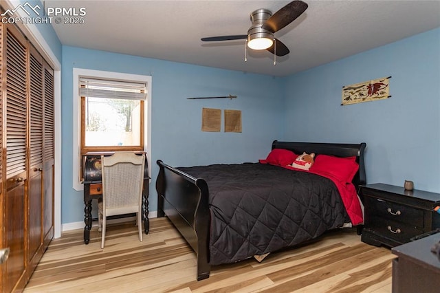 7815 Mallard Dr, Peyton, CO 80831 - bedroom featuring wood finished floors, a closet, ceiling fan, and baseboards