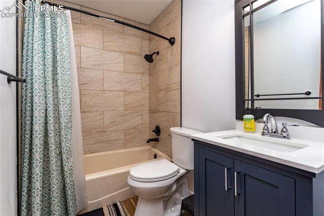 7815 Mallard Dr, Peyton, CO 80831 - full bathroom with toilet, shower / tub combo with curtain, and vanity