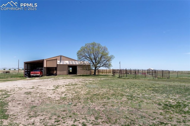 7815 Mallard Dr, Peyton, CO 80831 - view of yard with a pole building, an outdoor structure, a view of rural / pastoral area, and an exterior structure
