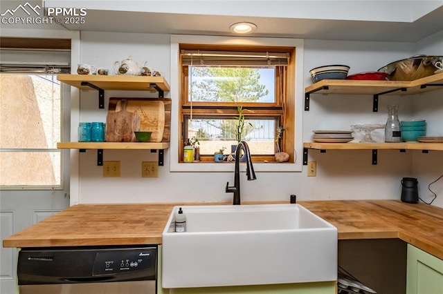 7815 Mallard Dr, Peyton, CO 80831 - kitchen featuring open shelves, butcher block countertops, a sink, and dishwashing machine