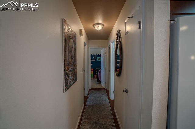 4580 N Sleepy Hollow Cir, Colorado Springs, CO 80917 - corridor featuring baseboards and carpet floors