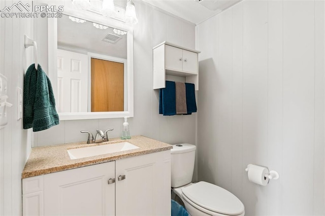 7350 Devinney Ct, Arvada, CO 80005 - bathroom featuring vanity and toilet