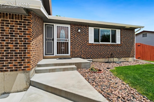 7350 Devinney Ct, Arvada, CO 80005 - entrance to property featuring brick siding