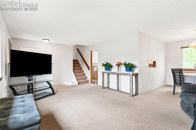 7350 Devinney Ct, Arvada, CO 80005 - living area with carpet flooring, stairs, baseboards, and a textured ceiling