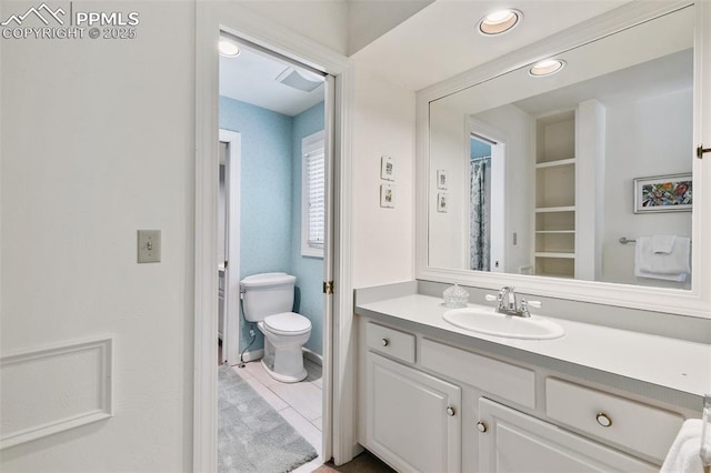 6 3rd St, Colorado Springs, CO 80906 - full bathroom featuring vanity, toilet, tile patterned flooring, and recessed lighting