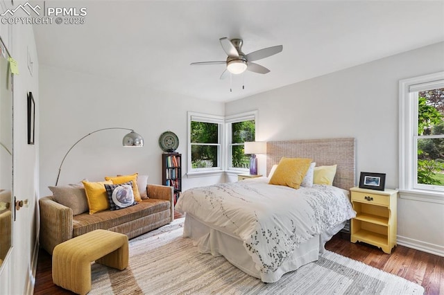 6 3rd St, Colorado Springs, CO 80906 - bedroom featuring wood finished floors, baseboards, and ceiling fan