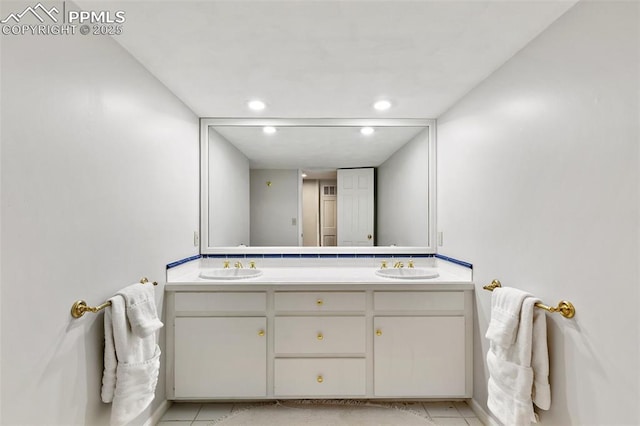 6 3rd St, Colorado Springs, CO 80906 - full bath with double vanity, tile patterned flooring, and recessed lighting