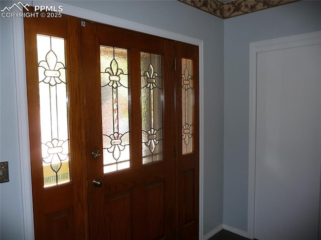 4307 Valli Vista Rd, Colorado Springs, CO 80915 - foyer entrance featuring baseboards