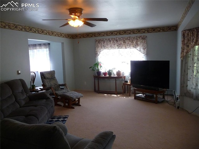 4307 Valli Vista Rd, Colorado Springs, CO 80915 - carpeted living room featuring healthy amount of natural light and a ceiling fan