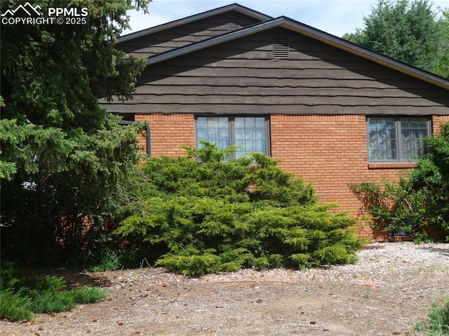 4307 Valli Vista Rd, Colorado Springs, CO 80915 - view of property exterior with brick siding