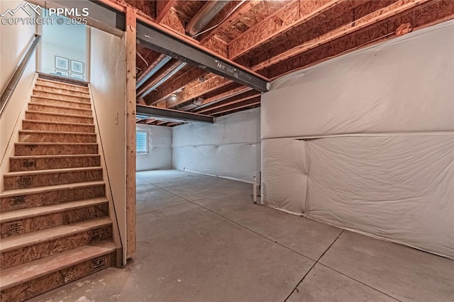 12670 Granite Ridge Dr, Peyton, CO 80831 - below grade area featuring stairs