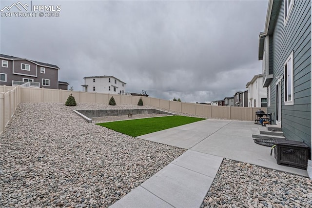 12670 Granite Ridge Dr, Peyton, CO 80831 - fenced backyard with a patio