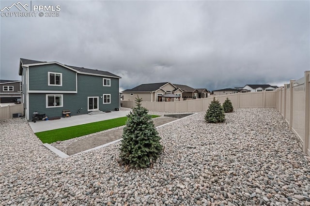 12670 Granite Ridge Dr, Peyton, CO 80831 - fenced backyard featuring a patio area and entry steps