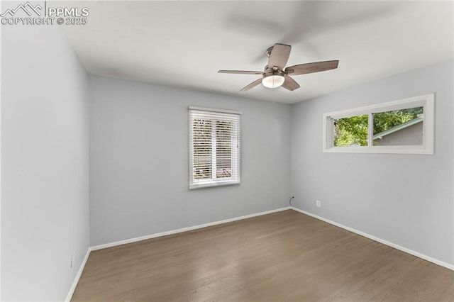 2321 N Meade Ave, Colorado Springs, CO 80907 - empty room featuring a ceiling fan, baseboards, and wood finished floors