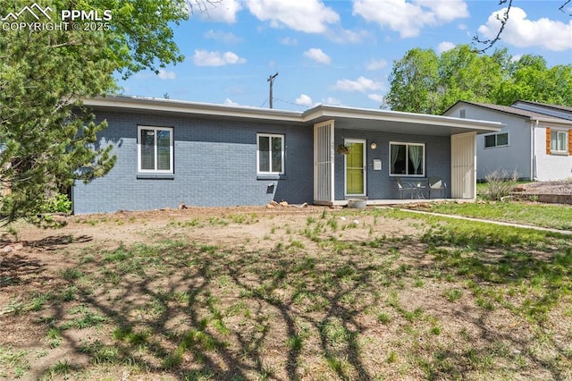 2321 N Meade Ave, Colorado Springs, CO 80907 - ranch-style house with brick siding
