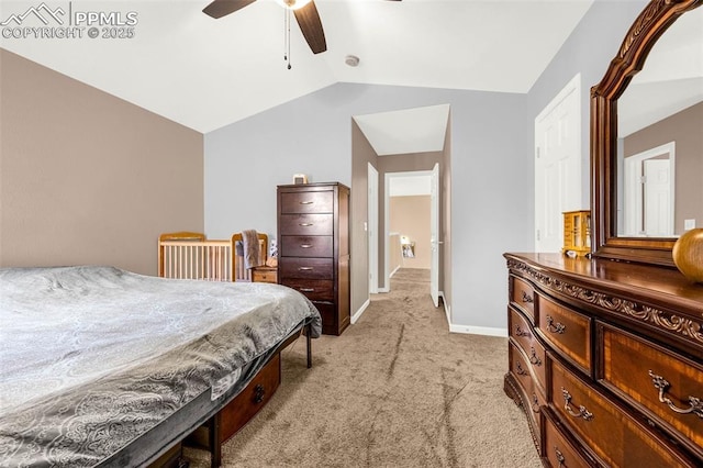 7526 Gallard Hts, Peyton, CO 80831 - bedroom featuring light carpet, lofted ceiling, baseboards, and a ceiling fan