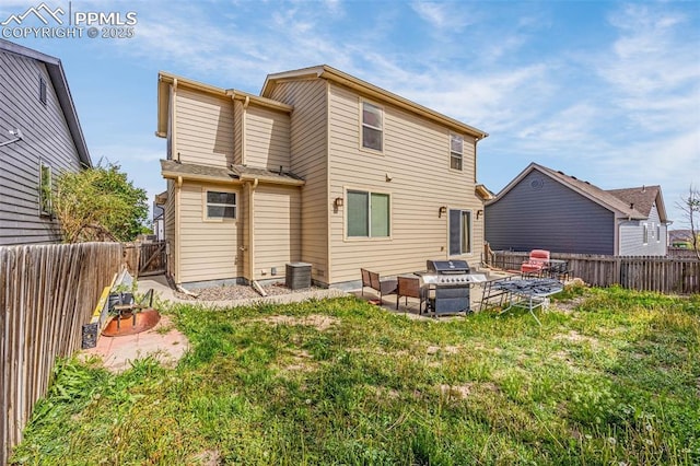 7526 Gallard Hts, Peyton, CO 80831 - back of property with a patio area, a fenced backyard, and central air condition unit