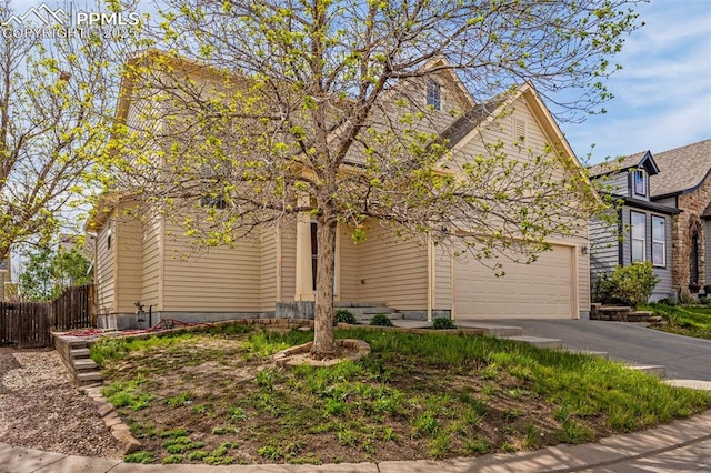 7526 Gallard Hts, Peyton, CO 80831 - view of front facade with driveway and a garage