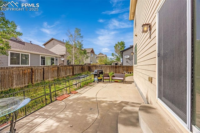 7526 Gallard Hts, Peyton, CO 80831 - fenced backyard with grilling area and a patio area