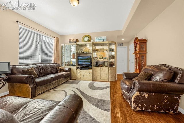 7526 Gallard Hts, Peyton, CO 80831 - living area with wood finished floors and baseboards