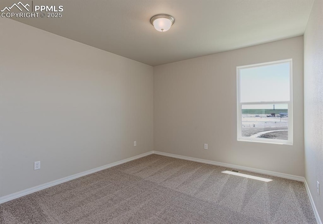 5216 Devers Ct, Colorado Springs, CO 80925 - empty room with carpet flooring and baseboards