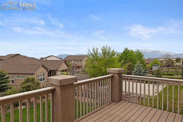 8059 Cinnamon Ct, Colorado Springs, CO 80927 - wooden terrace with a residential view and a mountain view