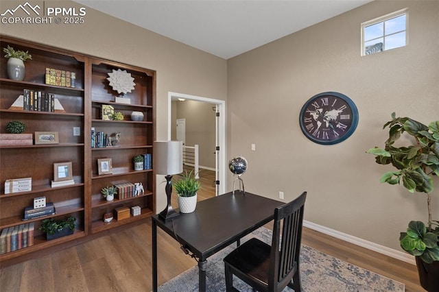 8059 Cinnamon Ct, Colorado Springs, CO 80927 - office area featuring baseboards and wood finished floors
