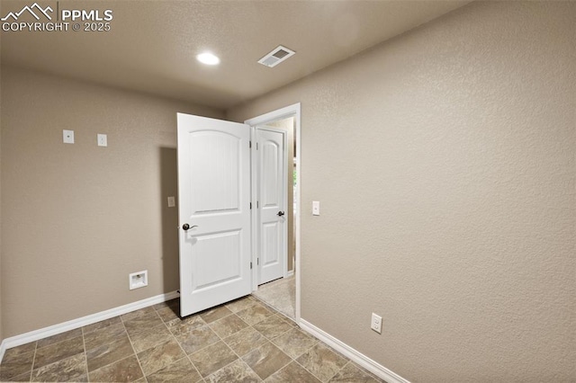 8059 Cinnamon Ct, Colorado Springs, CO 80927 - empty room with baseboards, recessed lighting, and stone finish floors