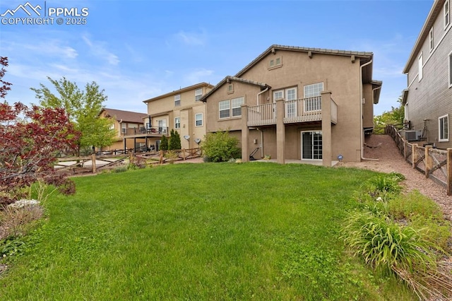 8059 Cinnamon Ct, Colorado Springs, CO 80927 - back of house with stucco siding