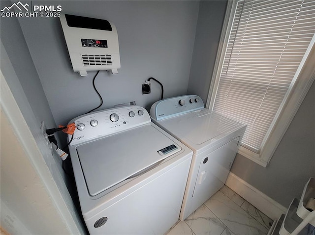 18 S 13th St, Colorado Springs, CO 80904 - laundry area featuring light marble finish flooring, washer and clothes dryer, and baseboards