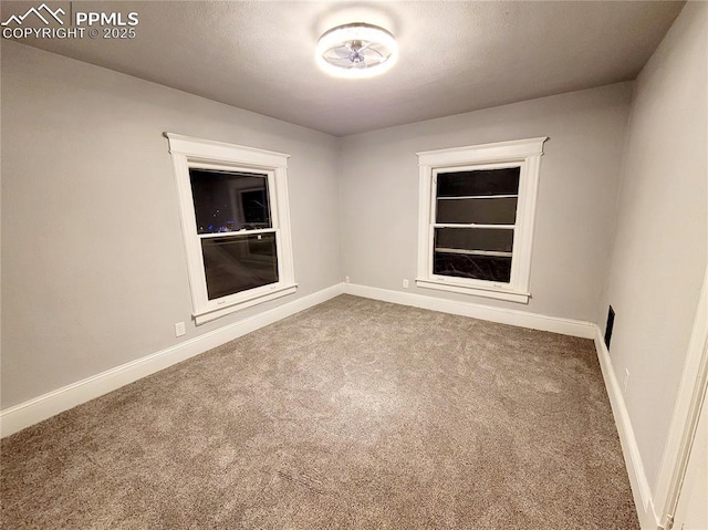 18 S 13th St, Colorado Springs, CO 80904 - carpeted spare room with baseboards