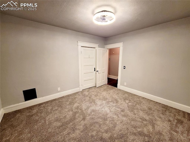 18 S 13th St, Colorado Springs, CO 80904 - carpeted empty room featuring baseboards