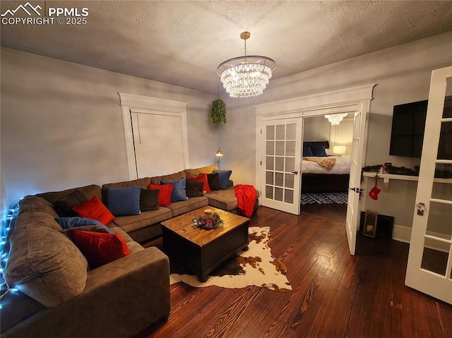 18 S 13th St, Colorado Springs, CO 80904 - living area featuring french doors, wood-type flooring, a chandelier, and a textured ceiling