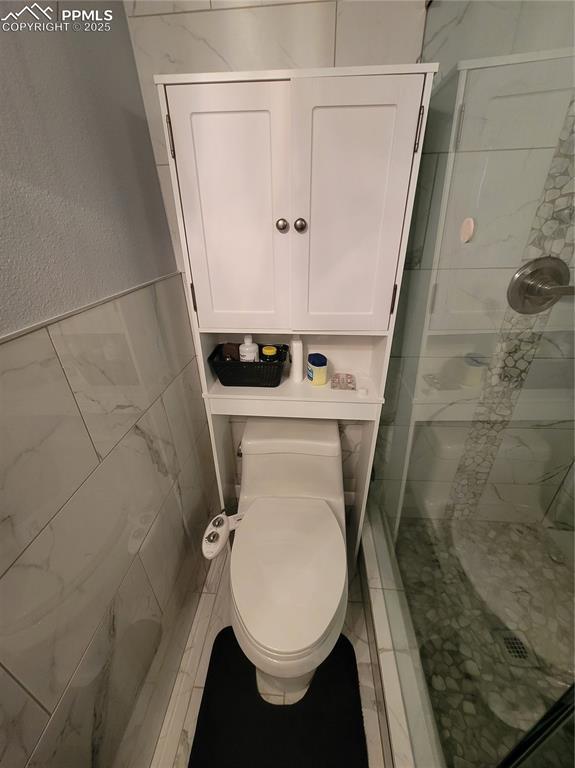 18 S 13th St, Colorado Springs, CO 80904 - full bath with a shower stall and toilet