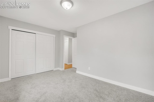 2201 Sonoma Dr, Colorado Springs, CO 80910 - unfurnished bedroom with carpet flooring, baseboards, and a closet