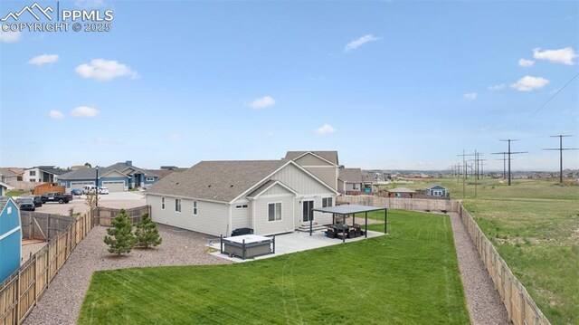 10442 Beckham St, Peyton, CO 80831 - view of side of property featuring a patio area, board and batten siding, and a residential view