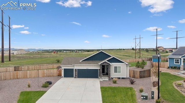 10442 Beckham St, Peyton, CO 80831 - view of front of home featuring an attached garage and concrete driveway