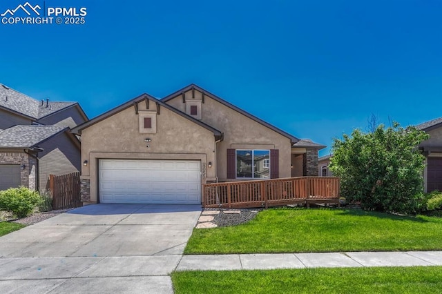 8055 Mount Hayden Dr, Colorado Springs, CO 80924 - single story home with stucco siding, concrete driveway, and an attached garage