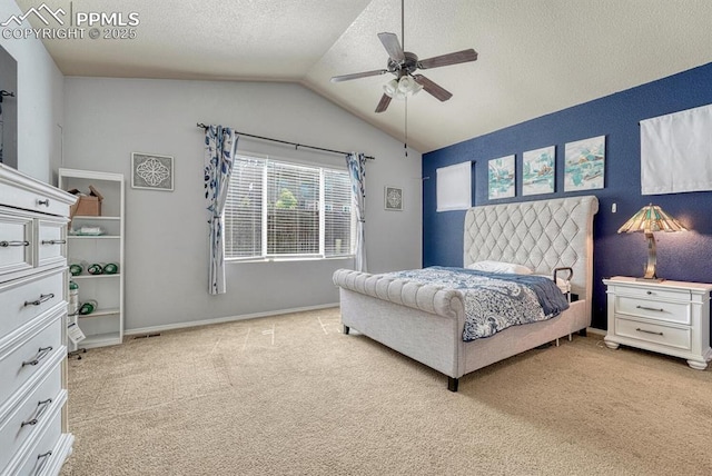 8055 Mount Hayden Dr, Colorado Springs, CO 80924 - carpeted bedroom with vaulted ceiling, a textured ceiling, and a ceiling fan