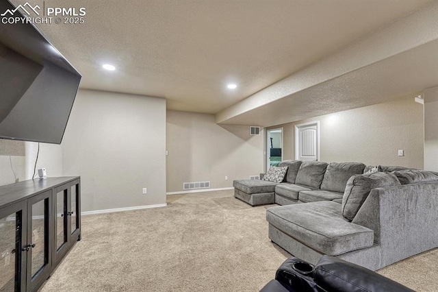 8055 Mount Hayden Dr, Colorado Springs, CO 80924 - carpeted living area with recessed lighting and a textured ceiling