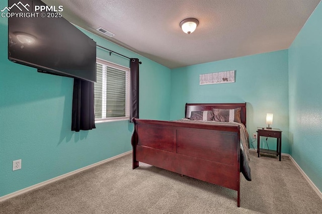 8055 Mount Hayden Dr, Colorado Springs, CO 80924 - carpeted bedroom with a textured ceiling and baseboards
