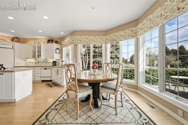 3479 Hill Cir, Colorado Springs, CO 80904 - dining area featuring plenty of natural light, recessed lighting, and light wood finished floors