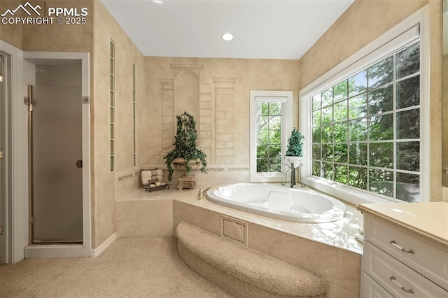 3479 Hill Cir, Colorado Springs, CO 80904 - full bath with a bath, a stall shower, vanity, and recessed lighting