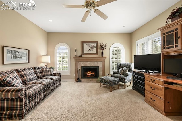 3479 Hill Cir, Colorado Springs, CO 80904 - living room with light colored carpet, a ceiling fan, a tile fireplace, and recessed lighting