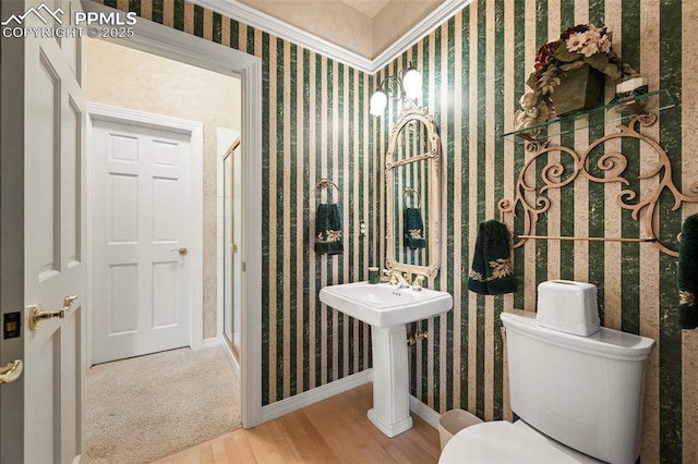 3479 Hill Cir, Colorado Springs, CO 80904 - bathroom with a shower stall, wood finished floors, and wallpapered walls